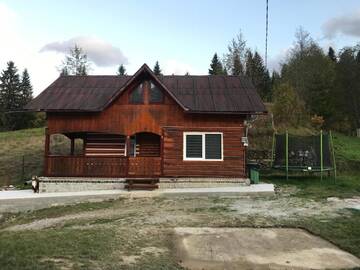 Фото номера Дом с 4 спальнями Лоджи Căsuța din Pădure г. Кымпулунг-Молдовенеск 7