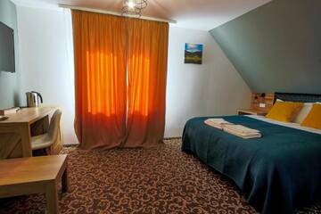 Фото номера Номер Делюкс Отели типа «постель и завтрак» Residence Rooms Bucovina г. Кымпулунг-Молдовенеск 7