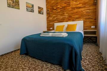 Фото номера Апартаменты - 1-й этаж Отели типа «постель и завтрак» Residence Rooms Bucovina г. Кымпулунг-Молдовенеск 4
