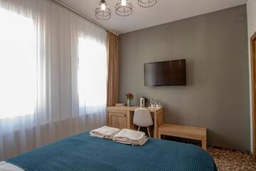Фото номера Апартаменты - 1-й этаж Отели типа «постель и завтрак» Residence Rooms Bucovina г. Кымпулунг-Молдовенеск 11