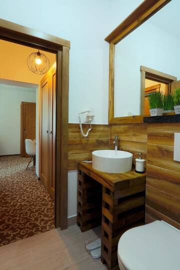 Фото номера Апартаменты - 1-й этаж Отели типа «постель и завтрак» Residence Rooms Bucovina г. Кымпулунг-Молдовенеск 17