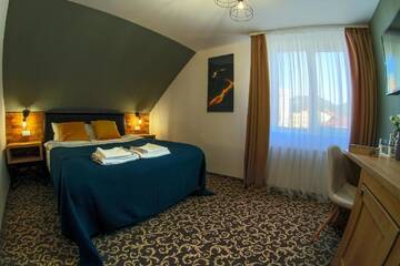 Фото номера Улучшенные апартаменты Отели типа «постель и завтрак» Residence Rooms Bucovina г. Кымпулунг-Молдовенеск 7