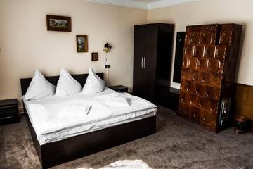 Фото номера Номер с кроватью размера «king-size» и балконом Гостевой дом Casa Comfort г. Кымпулунг-Молдовенеск 5