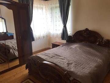 Фото номера Двухместный номер с 1 кроватью, вид на сад Гостевой дом Casa Cristi г. Кымпулунг-Молдовенеск 12