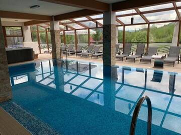 Фото номера Номер Делюкс с кроватью размера «king-size» Гостевой дом Aqua Alpin Centru Spa г. Кымпулунг-Молдовенеск 8